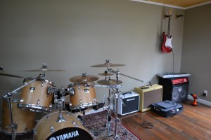 Jesse's studio is a space where he can play his drums and guitar.