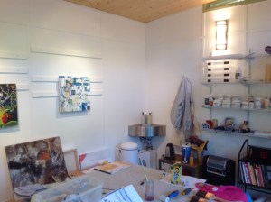 The couple painted their walls white to allow their art work to exist in a neutral space.