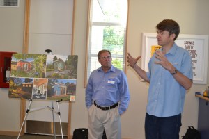 Modern-Shed General Manager Tim Vack and owner Ryan Smith discuss the possibilities for a Modern-Shed at a Peninsula Credit Union event.