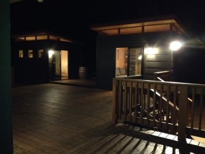 Holly and Chris' twin Modern-Sheds at night.